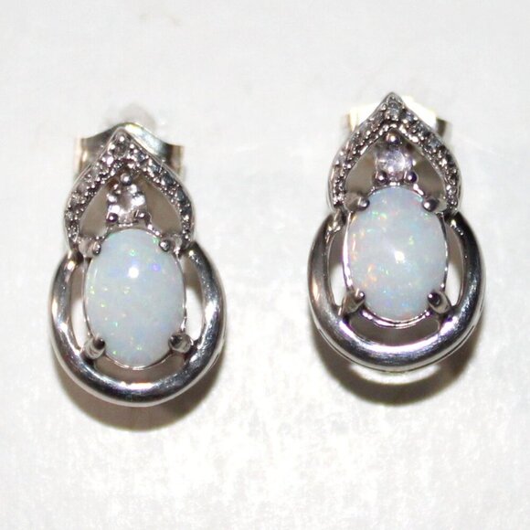 Sterling Silver Lab Created Opal Stud Earrings - Picture 1 of 5